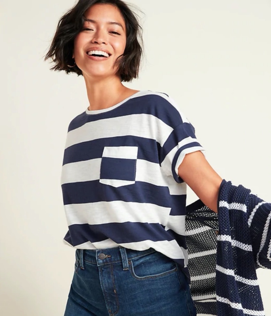 woman in blue and white striped shirt