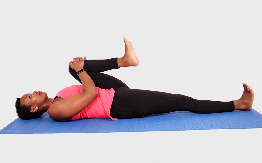 Knee To The Chest | 9 Stretches To Ease Lower Back Pain | Her Beauty