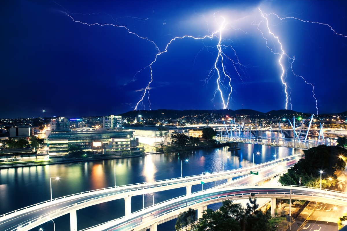 a striking image of lightning strikers over brisbane australia