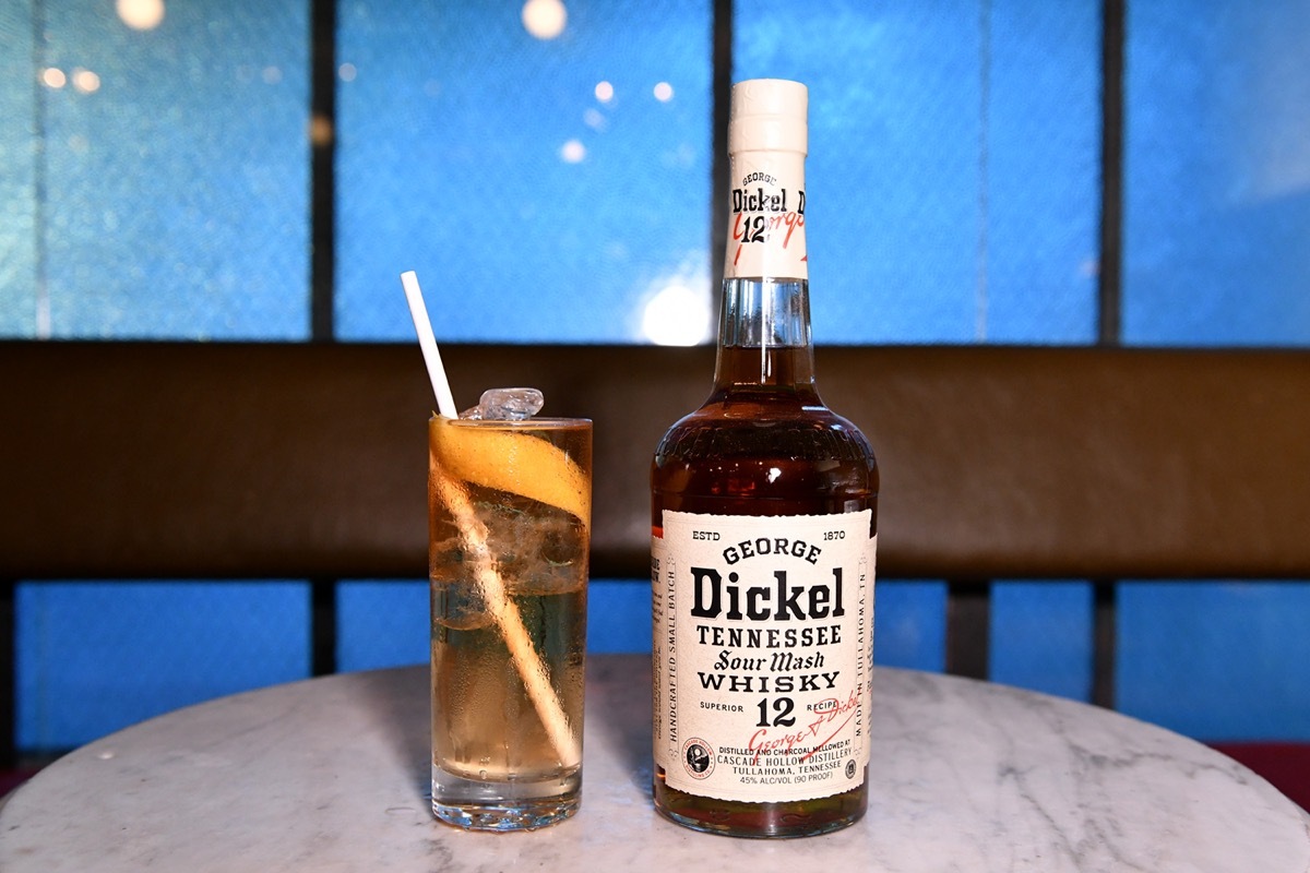 A bottle of George Dickel and glass