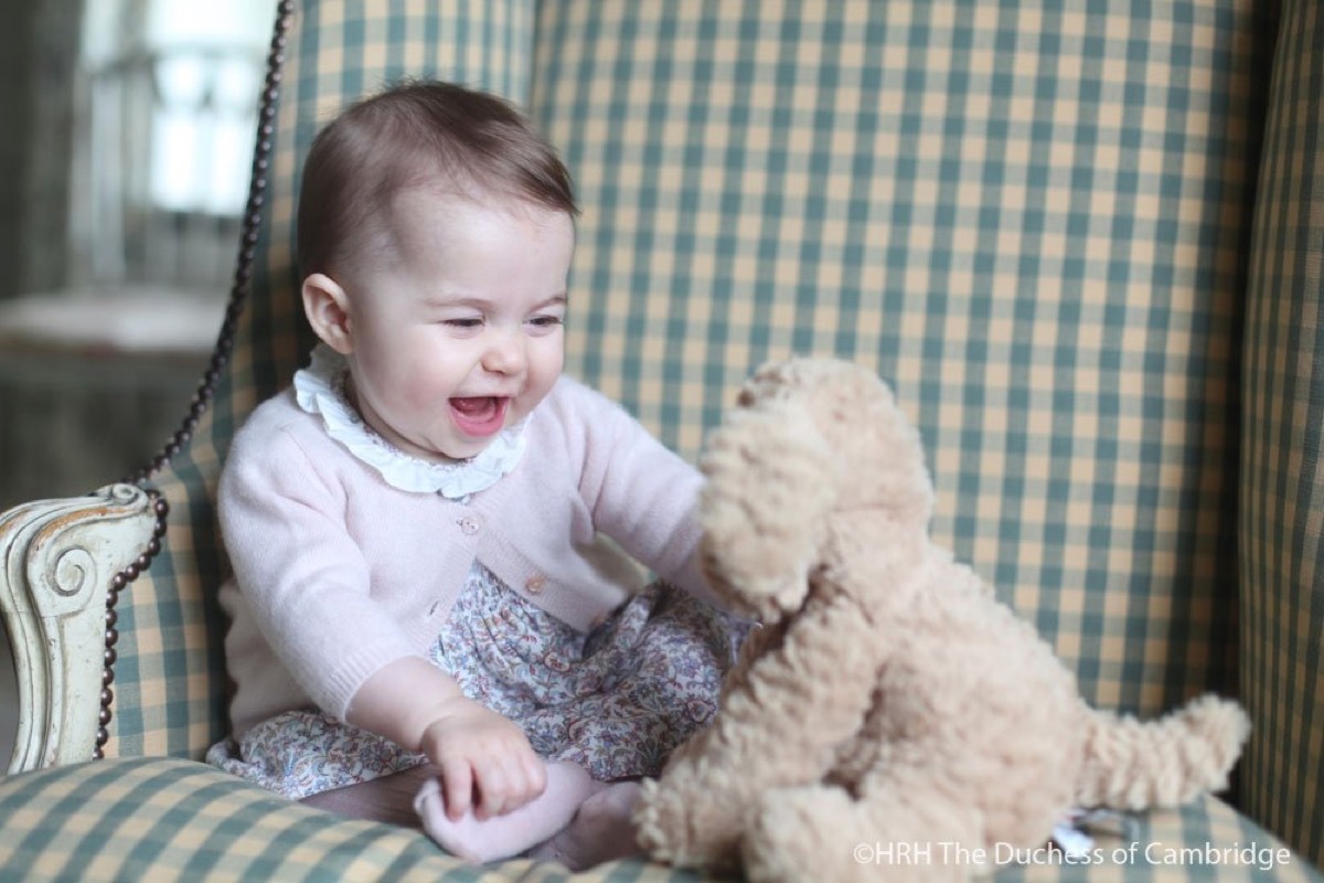 princess charlotte photo with stuffed dog