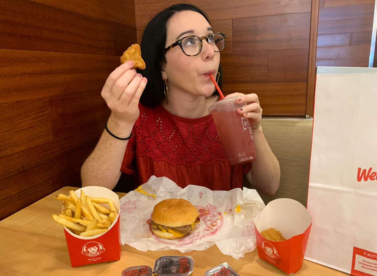 ann marie eating fast food at wendys enjoying nuggets