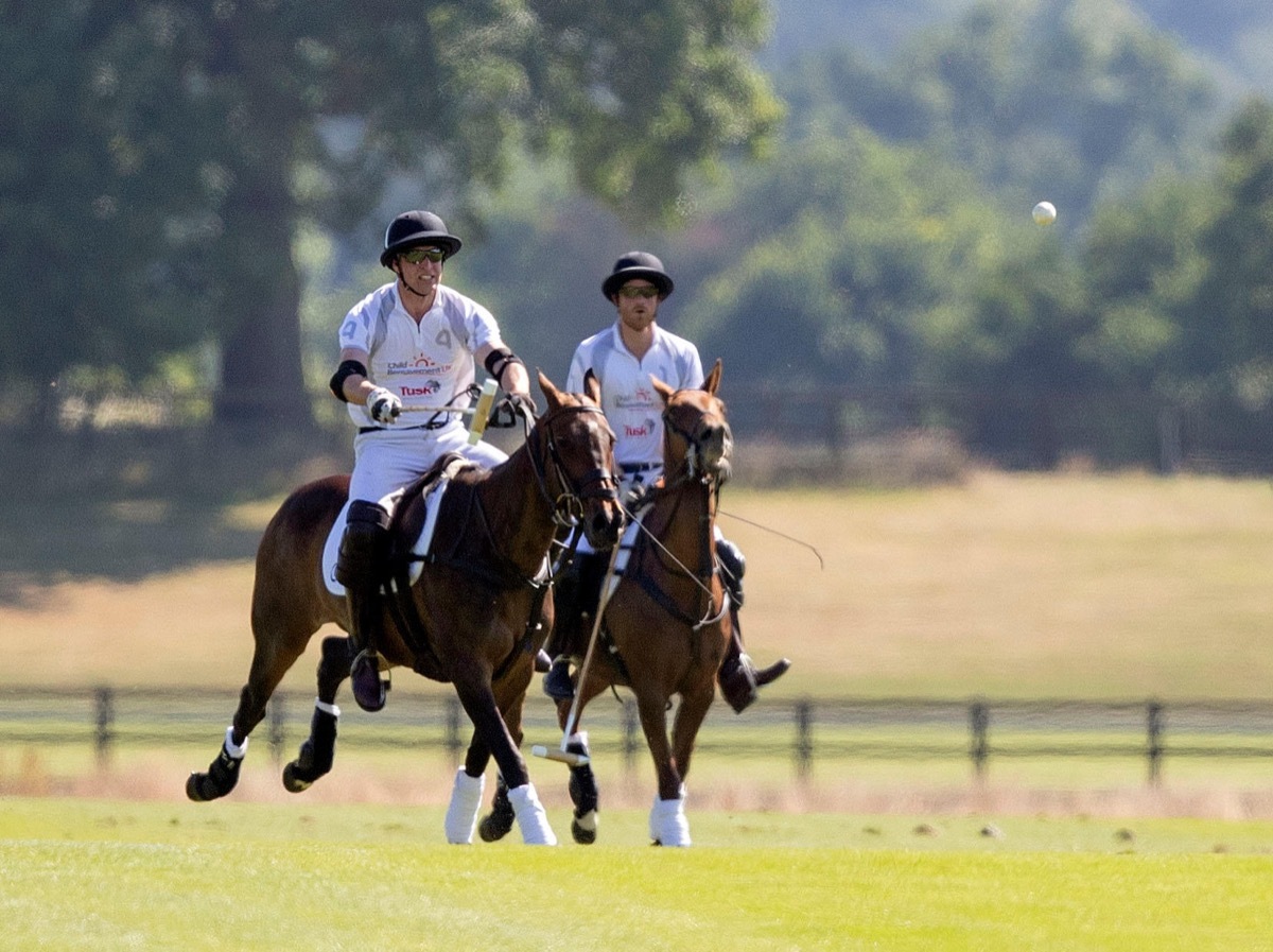 The Duke of Cambridge (left) and the Duke of Sussex playing polo at Coworth Park, Ascot.