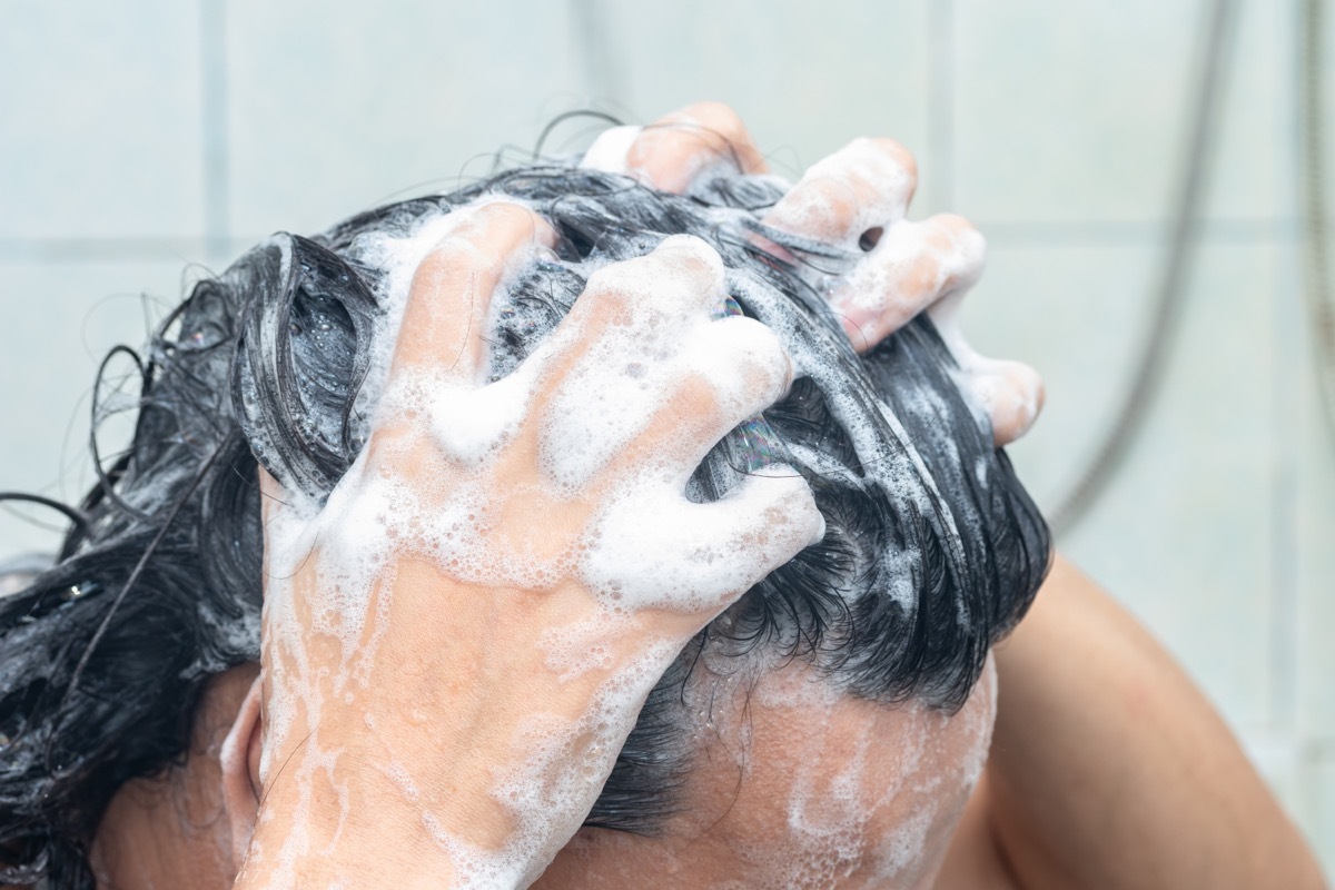 Man Shampooing His Head