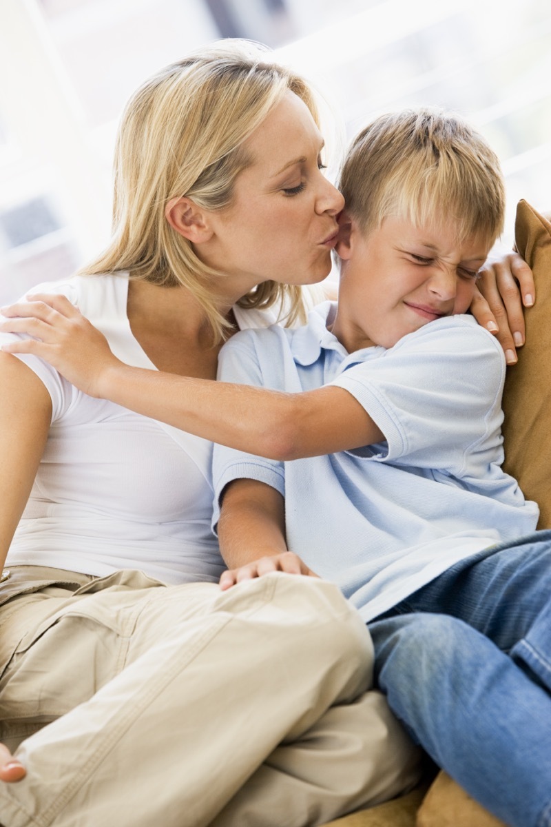 mom kissing son