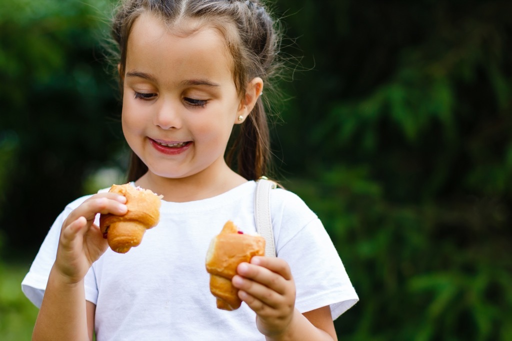 girl eating pastries