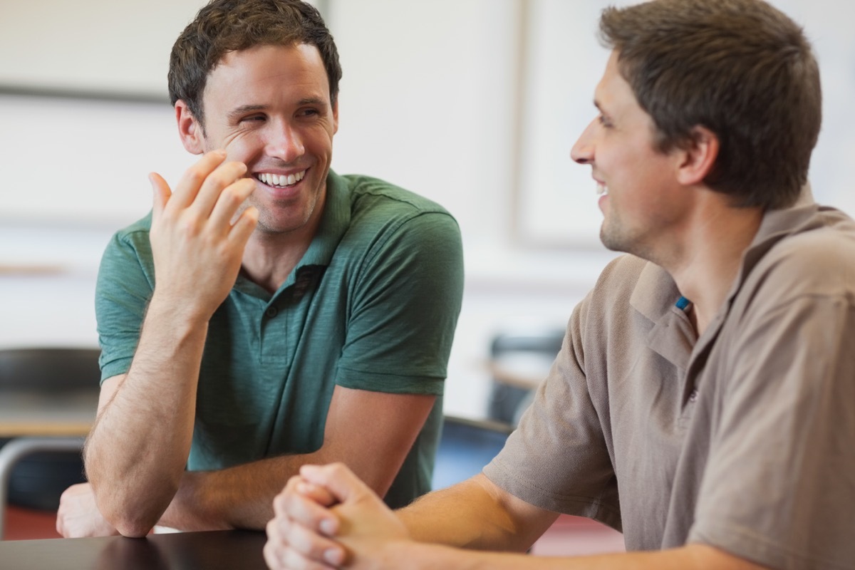 Men talking and laughing