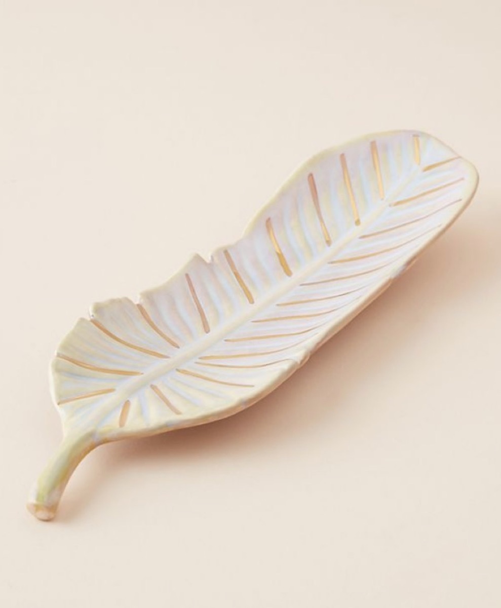 orange and white leaf-shaped ceramic dish