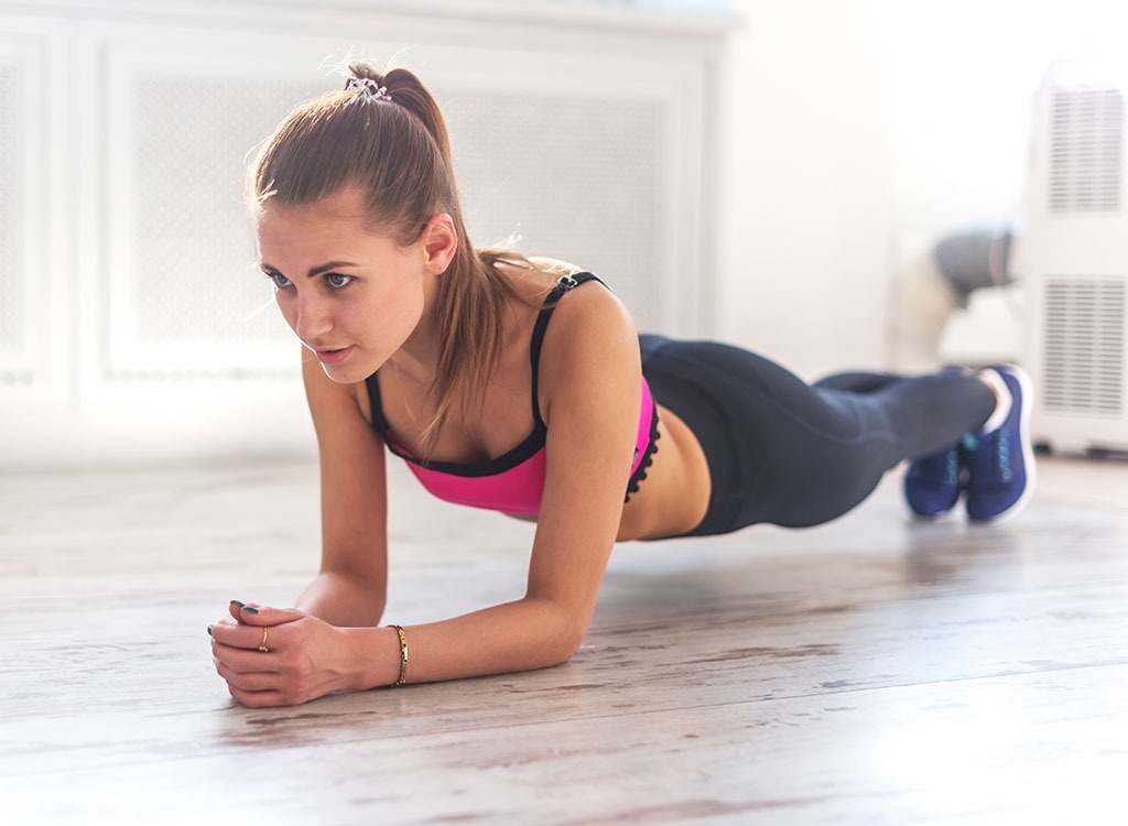 woman plank - how to lose weight after 30