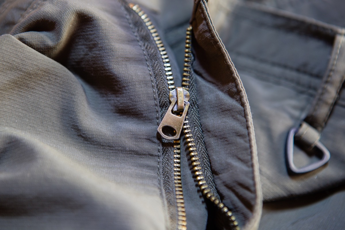 Old and damaged zipper on a jacket