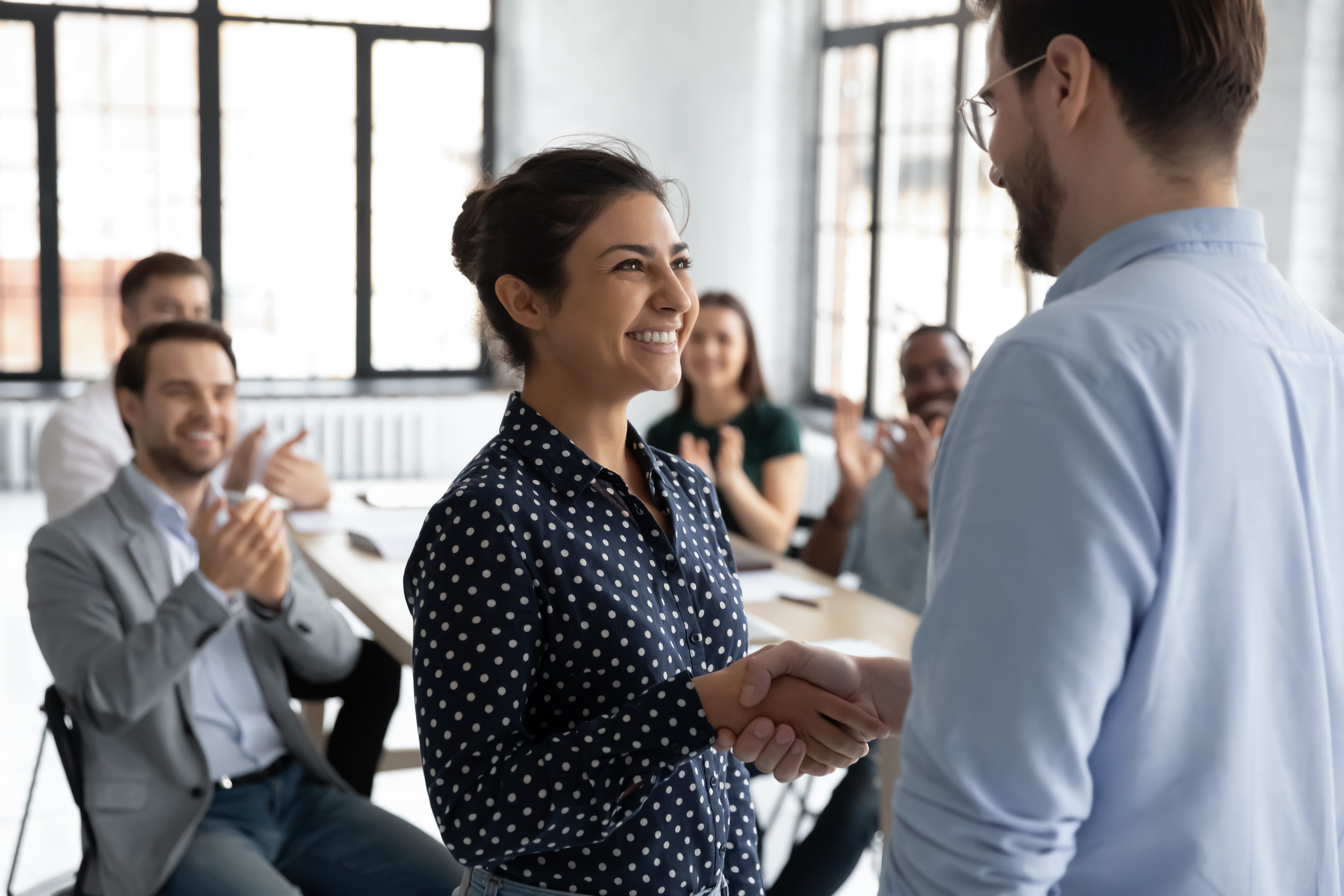 woman getting a promotion at work