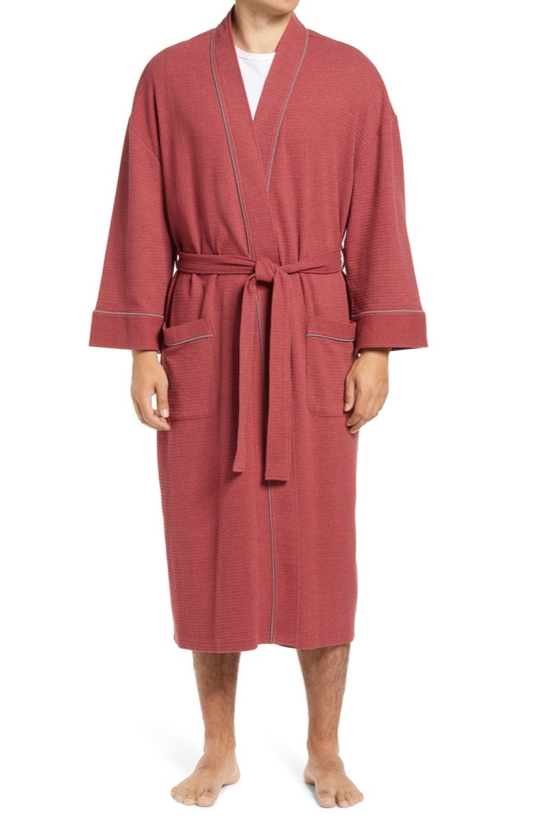 man in pinkish red robe