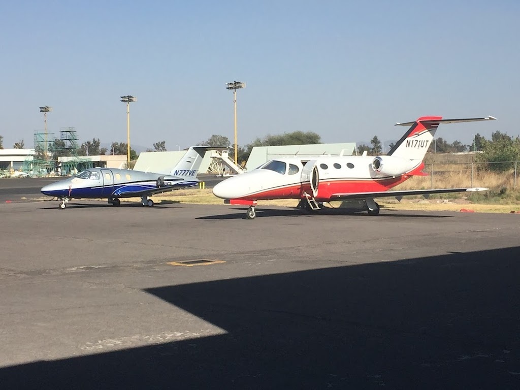 planes standing in private airport