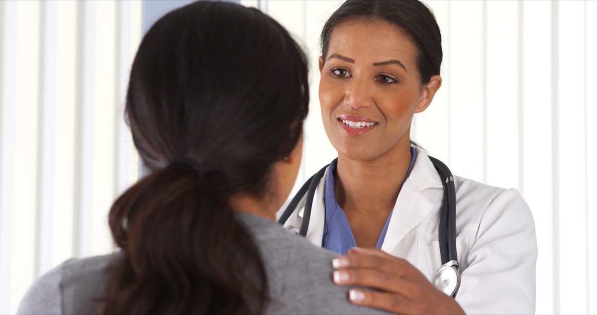 Doctor talking with patient