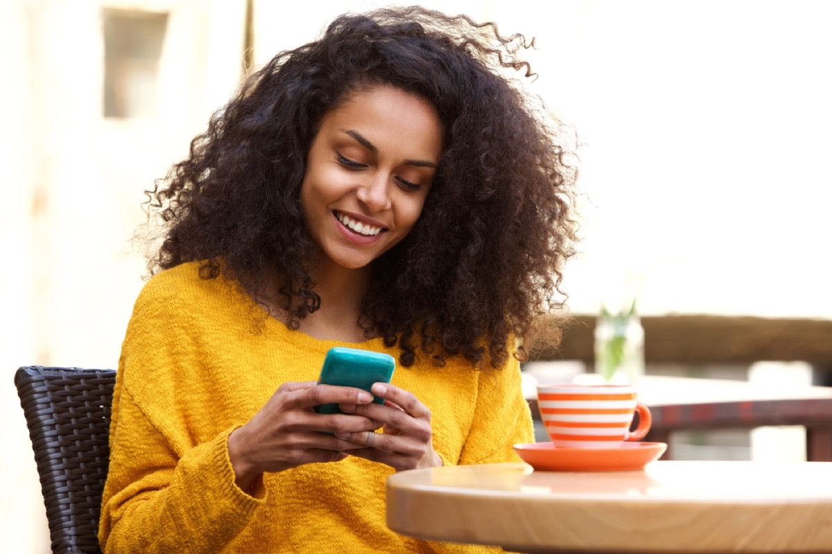 woman on phone, reach a customer service rep