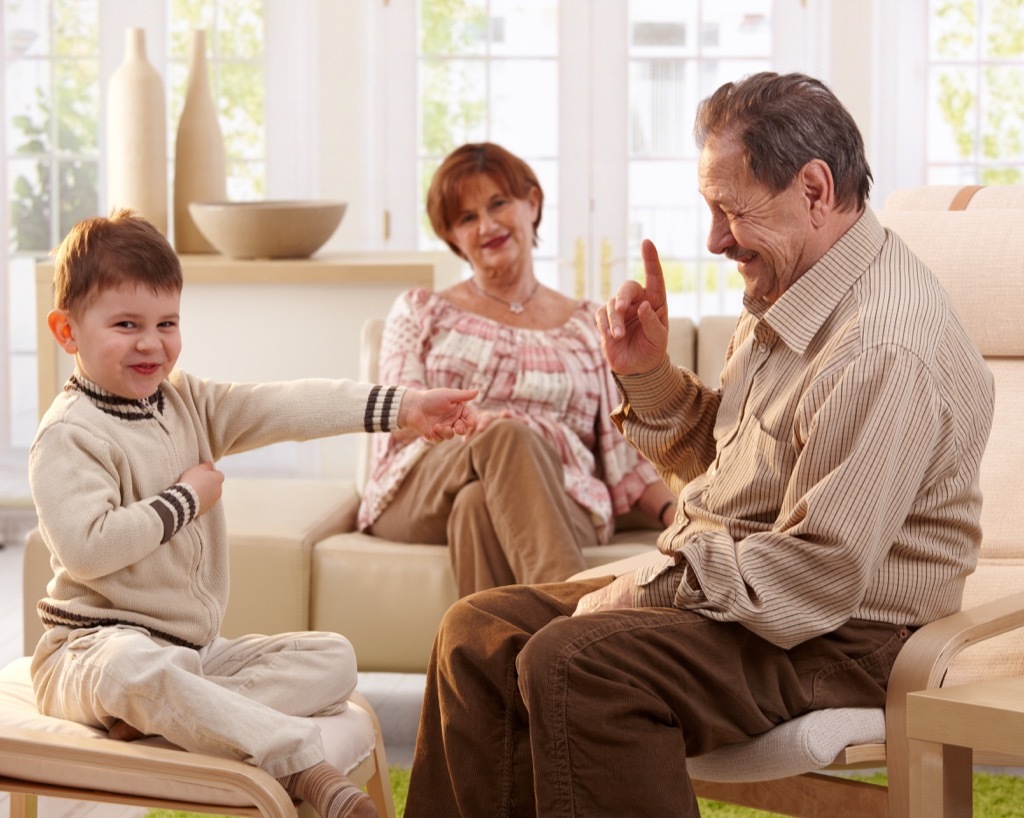 grandparents talking with young child