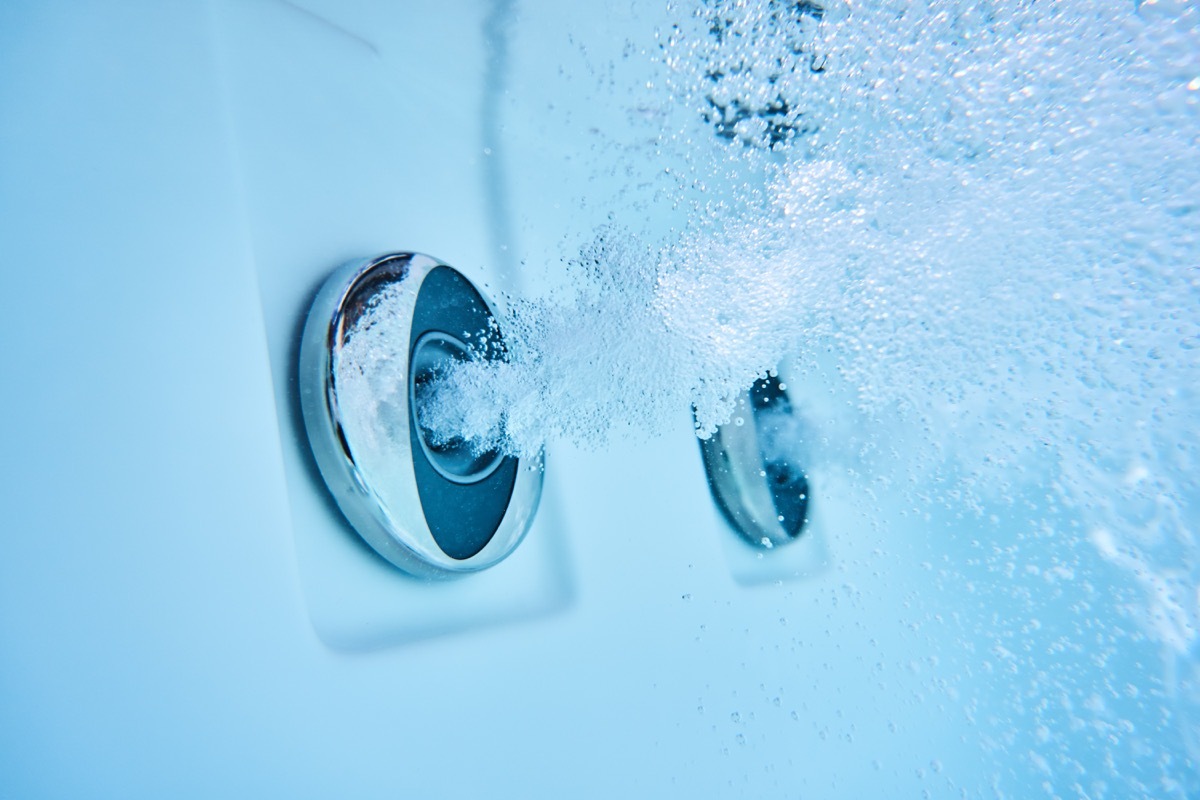 water stream of massage jets in jacuzzi