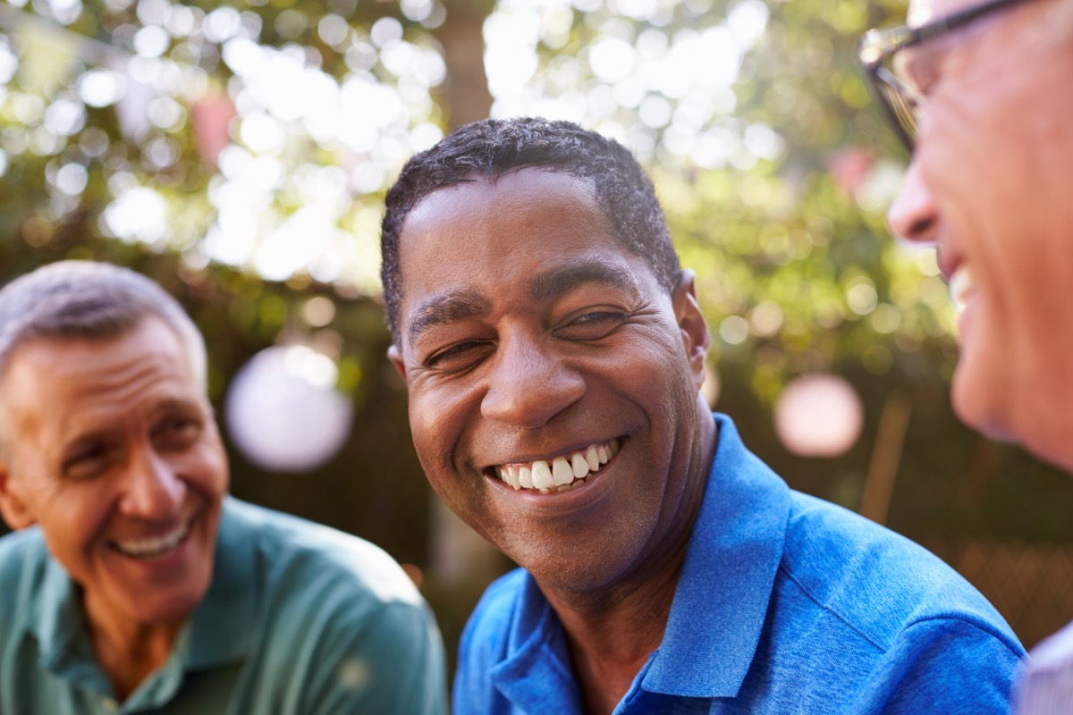 man laughing about funny responses to 