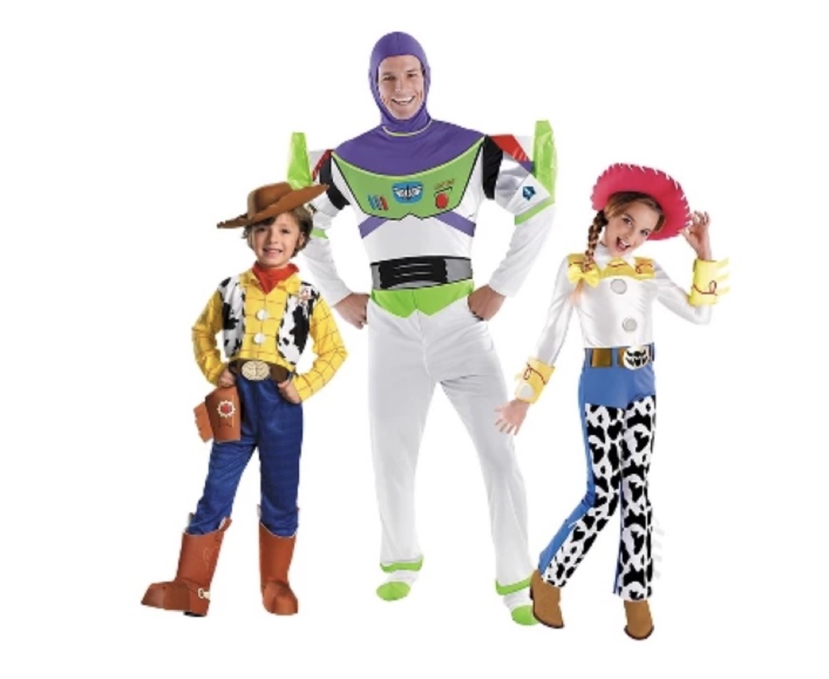 two children and adult man dressed as Toy Story characters, family halloween costumes