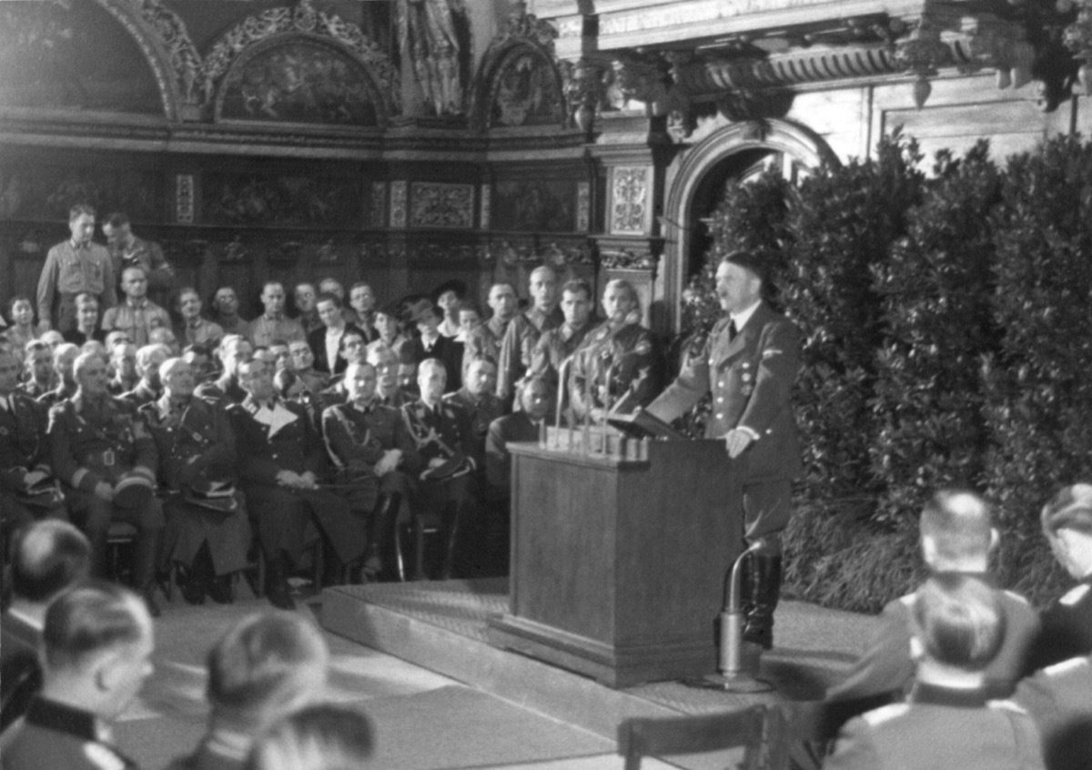 Hitler speaking in Danzig after the German invasion of Poland. He spoke to the German nation and the World from the main hall of the ancient Artus Court. World War 2. Sept. 19, 1939