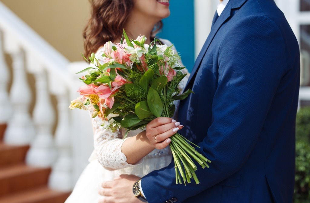 bride and groom embracing this is the age most people get married in every US state