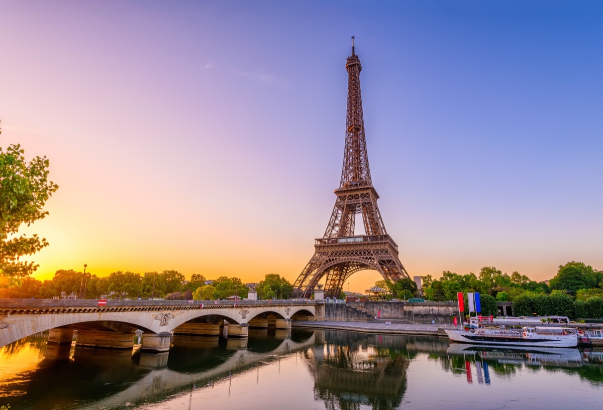 View of Eiffel Tower and river Seine at sunrise in Paris, France.