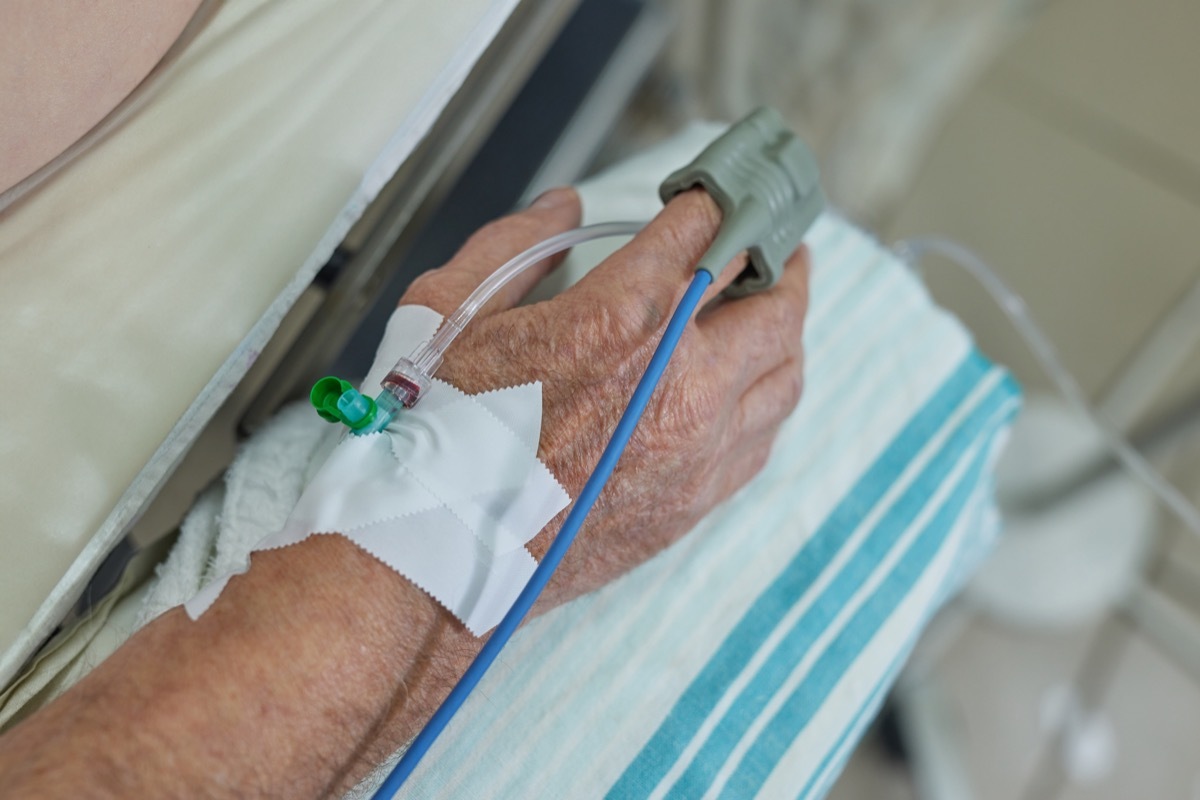 elderly man with iv at hospital