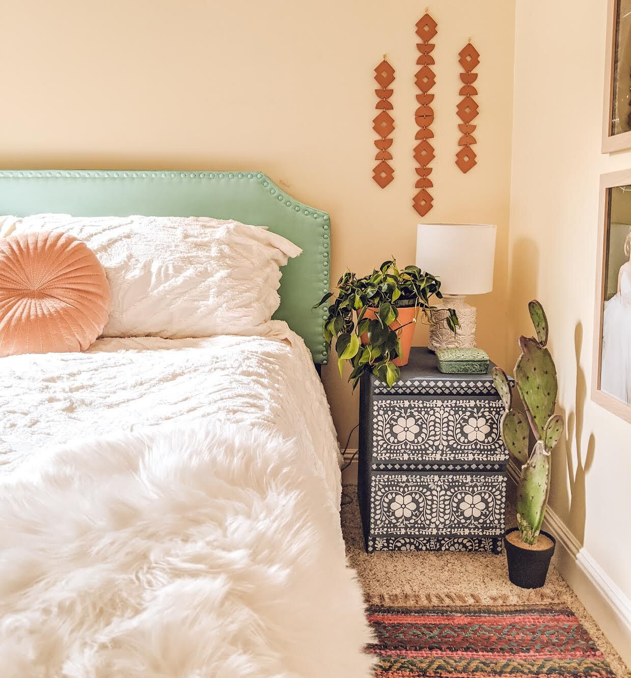 bedroom with green headboard