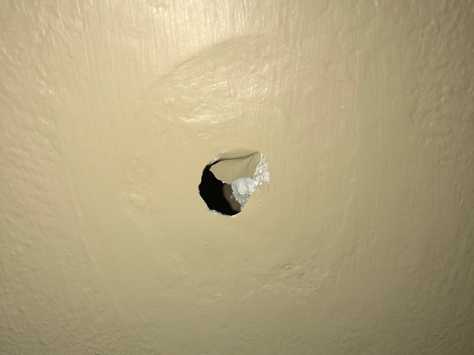 Image result for hole in a wall