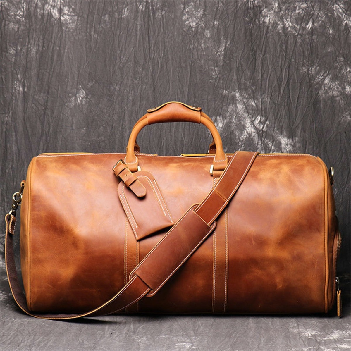 brown leather duffel bag