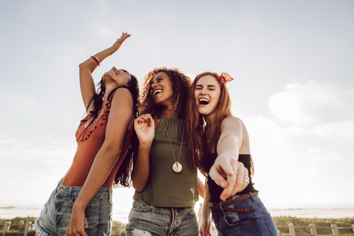 Three Excited Girlfriends Outside