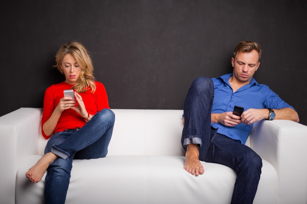 couple on phone ignoring each other