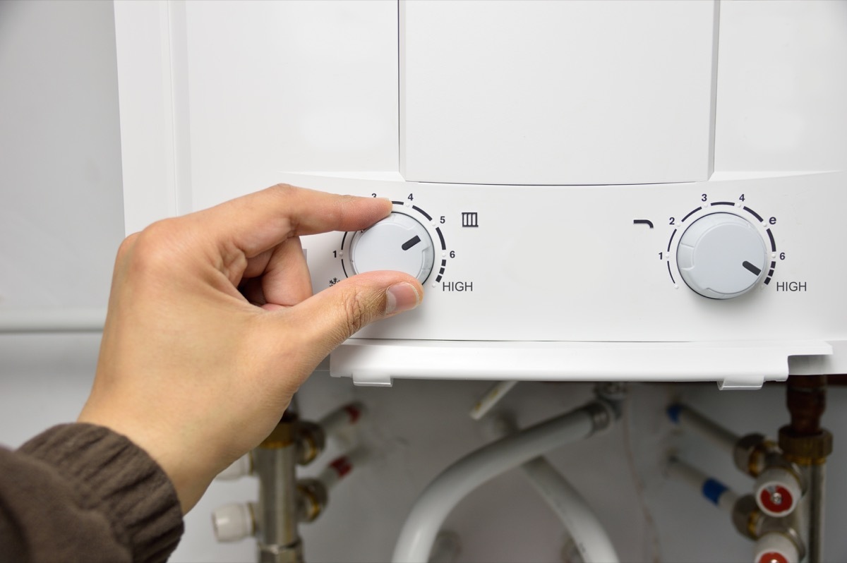 Person changing water heater