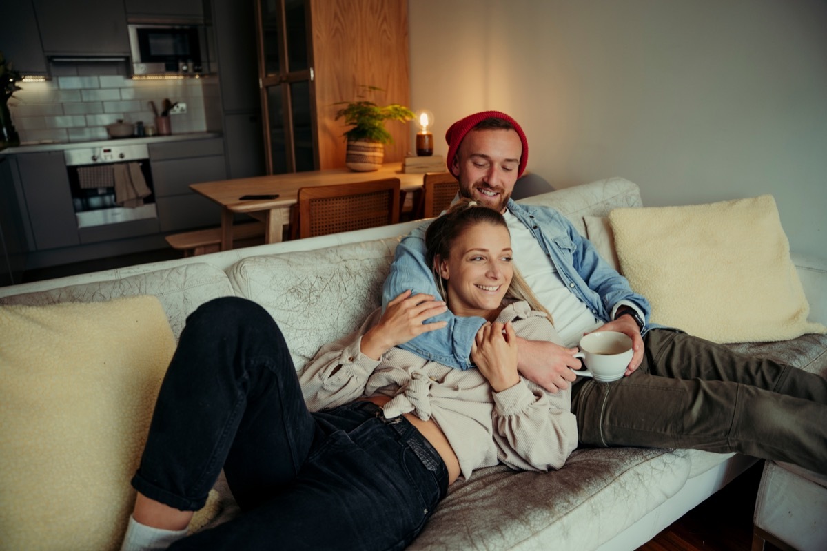 Couple Cuddling on the Couch