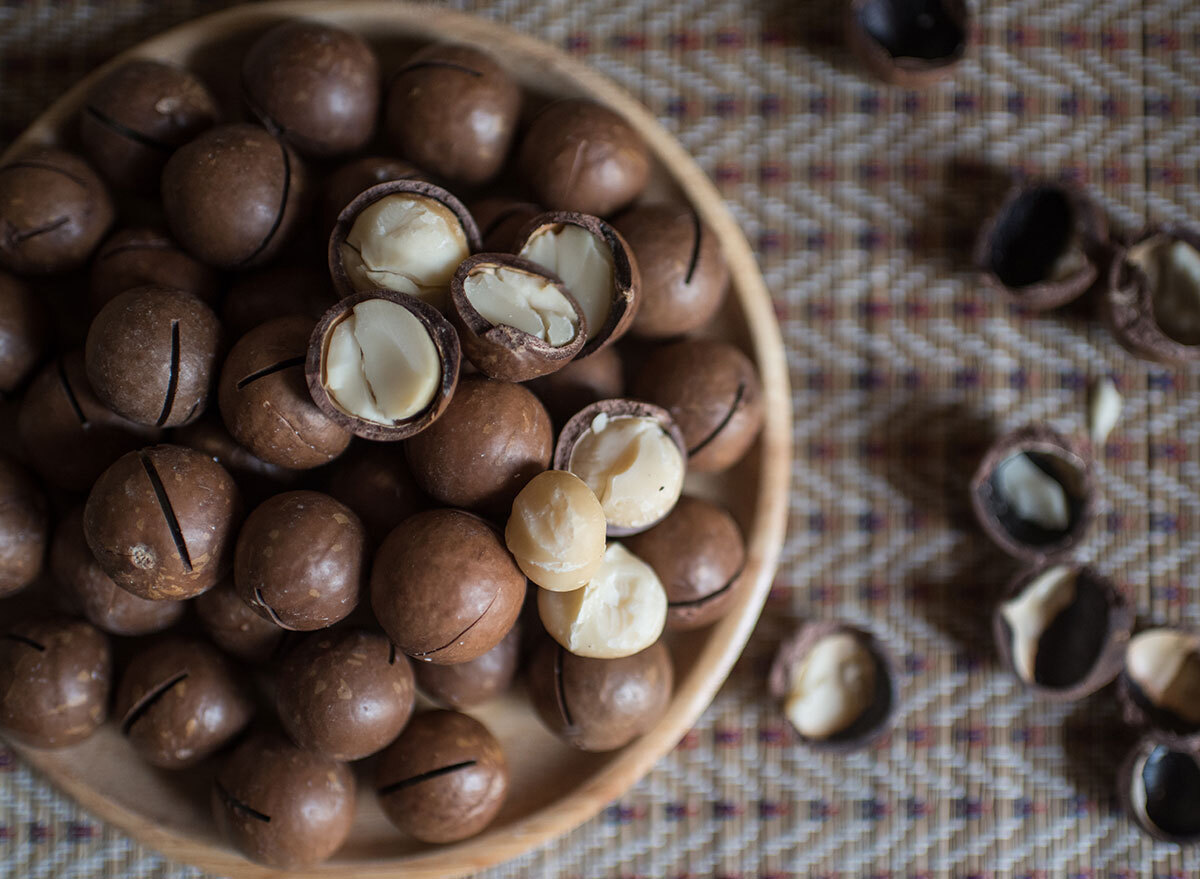 cracked shelled macadamia nuts in bowl