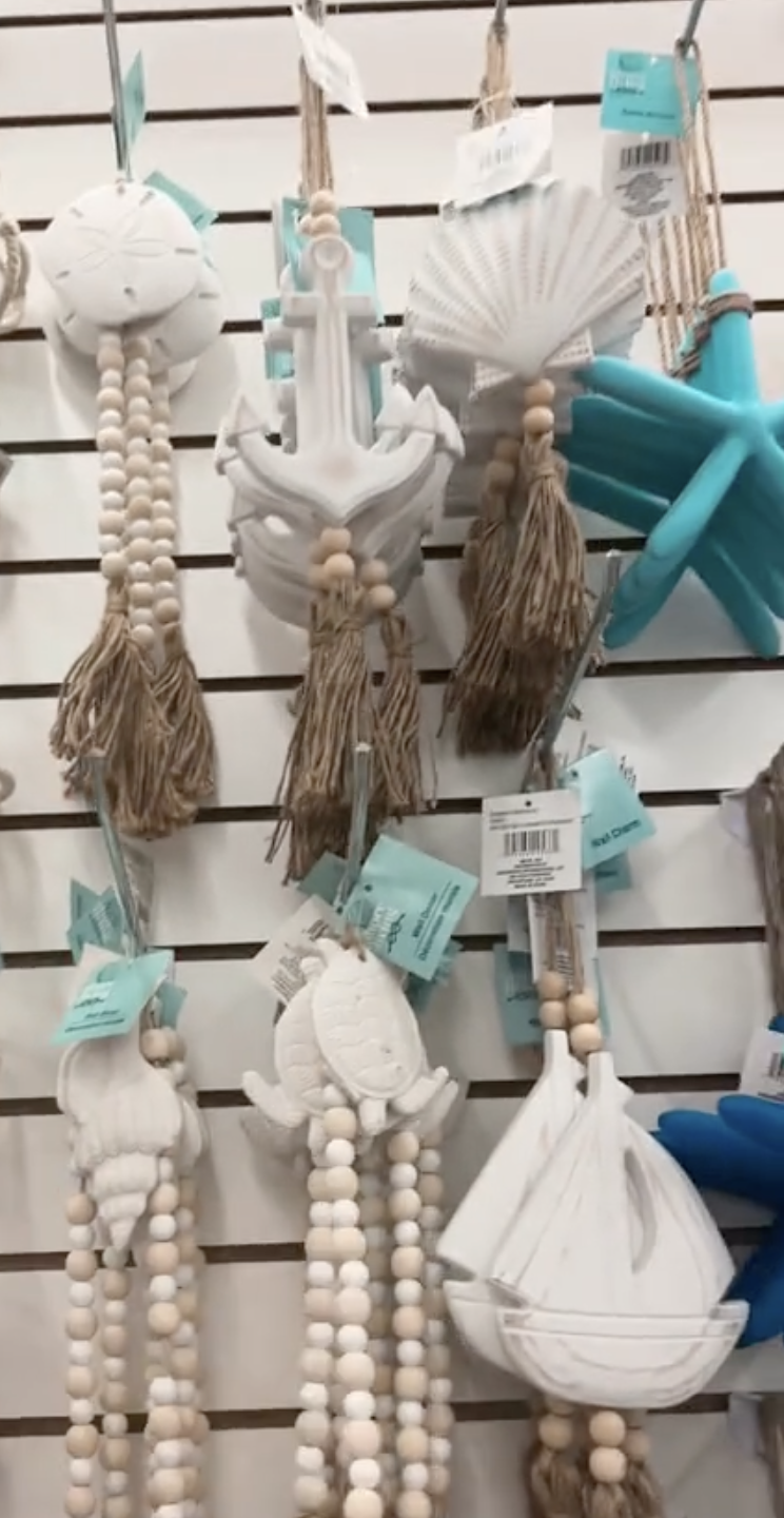 Display of nautical wall decor at Dollar Tree