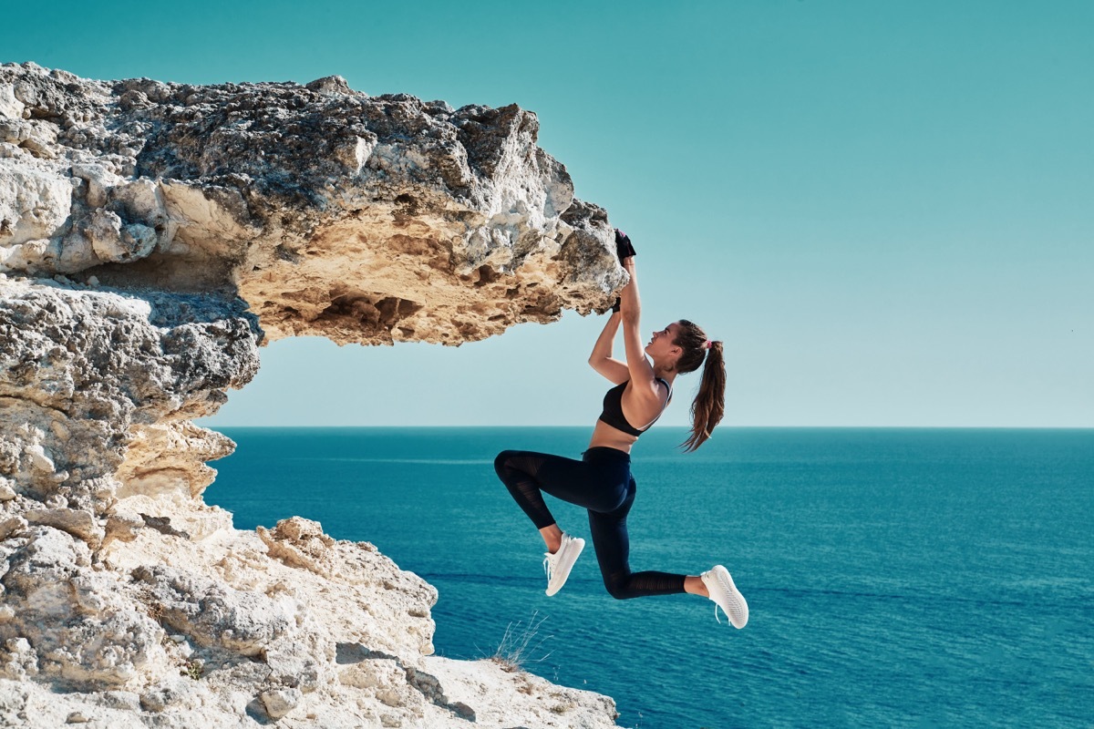 Girl Climbing Mountain