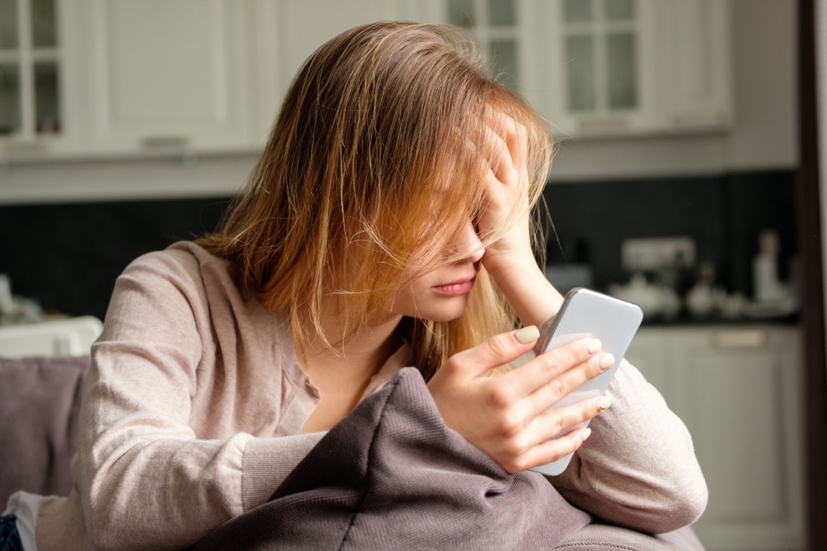 Upset girl with a phone