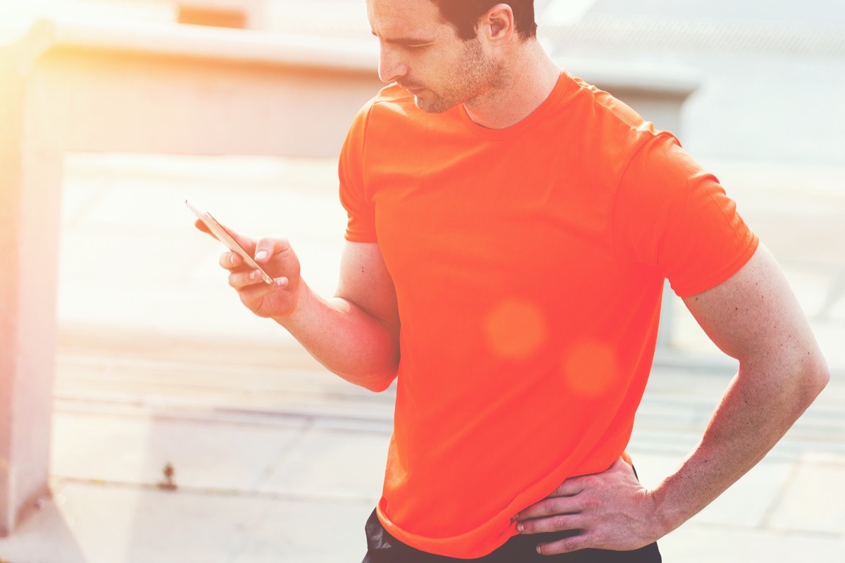 Man Jogging in Orange Shirt