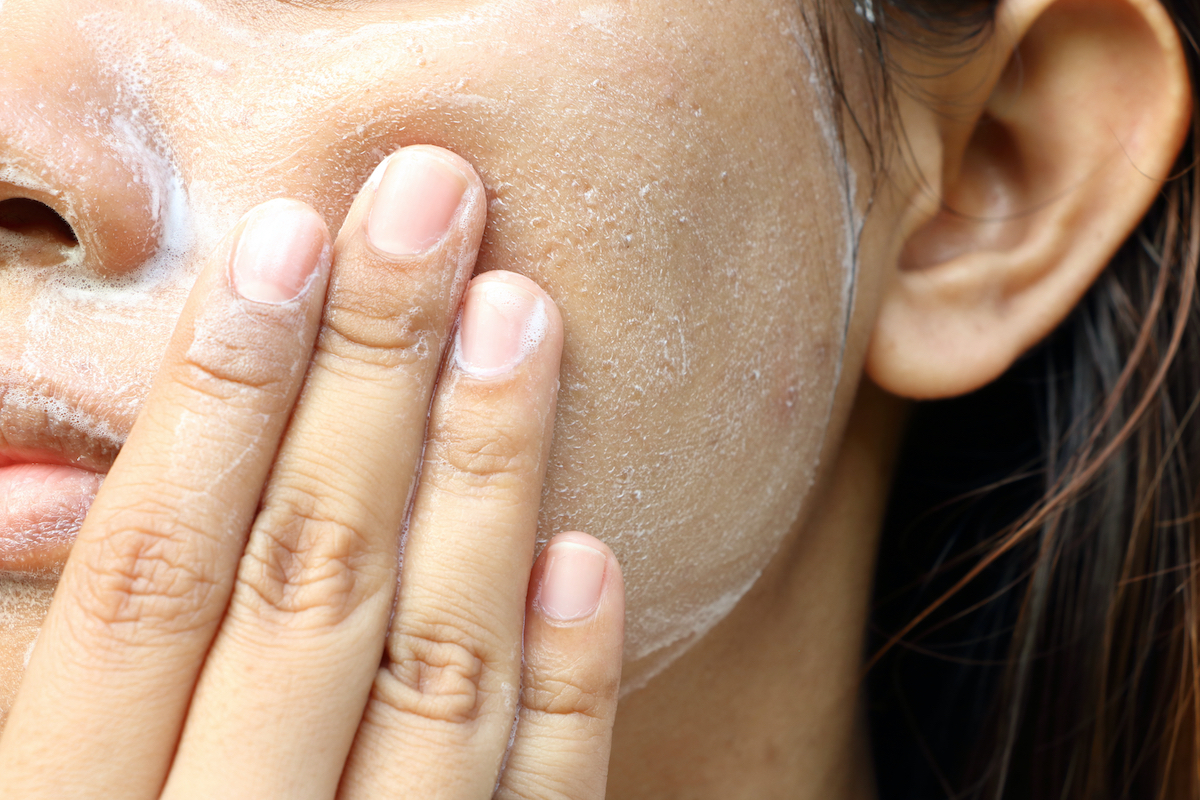 woman exfoliating