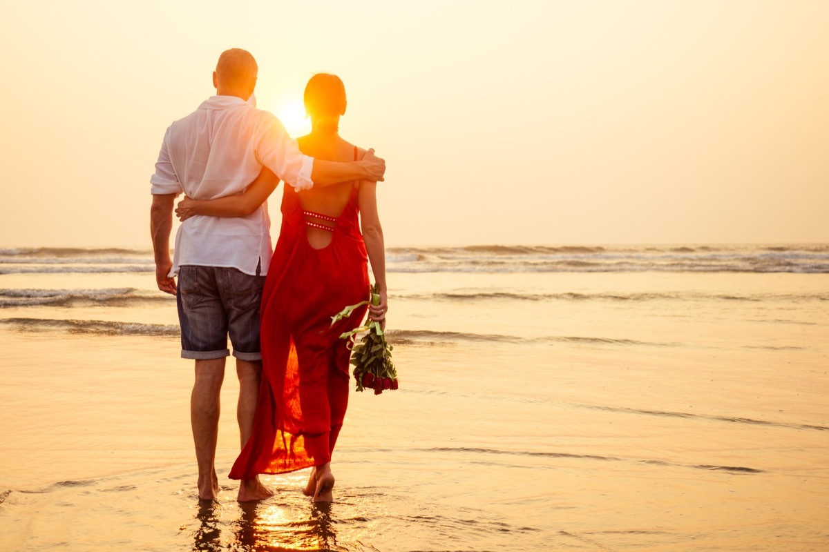 couple romantic walk on the beach