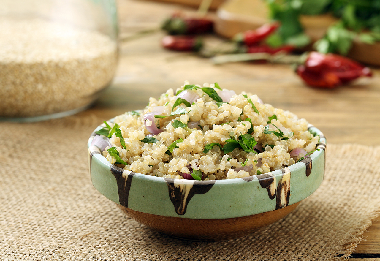 vegan quinoa salad in ceramic bowl