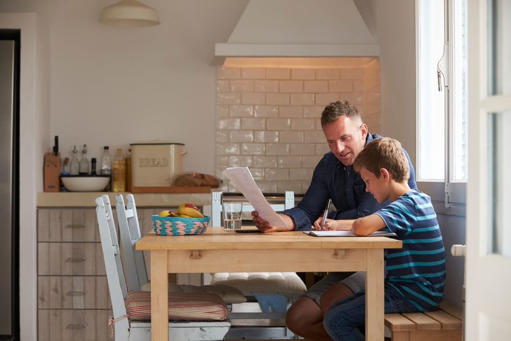 Father reading to his son