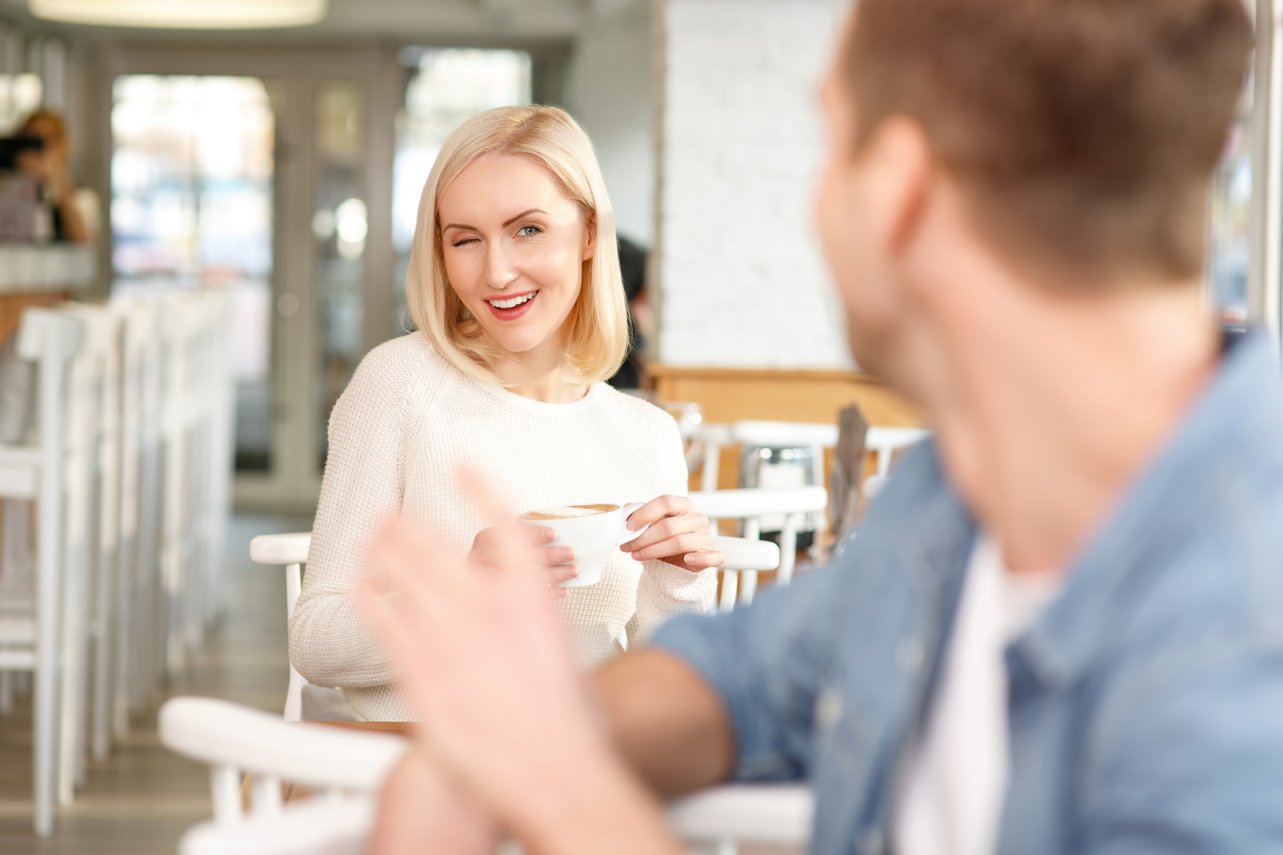 woman flirting with man