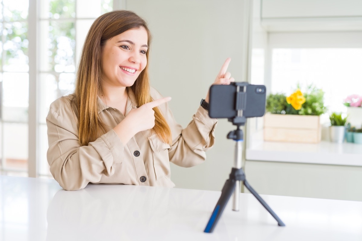 young woman on video call on iphone