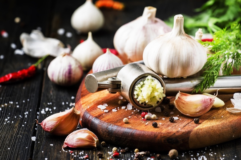 garlic press and garlic