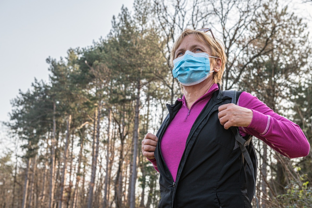 Senior woman Exercising in Nature Alone Due to Covid 19, Slovenia, Europe,Nikon D850