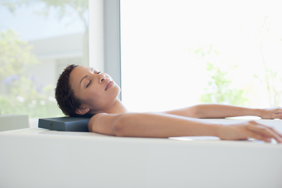 black woman in bath tub