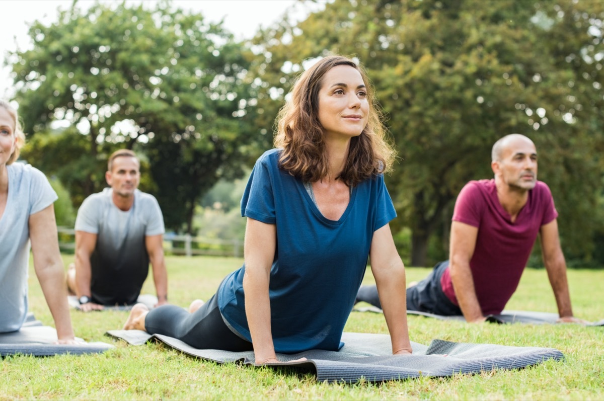 middle age caucasian woman doing yoga