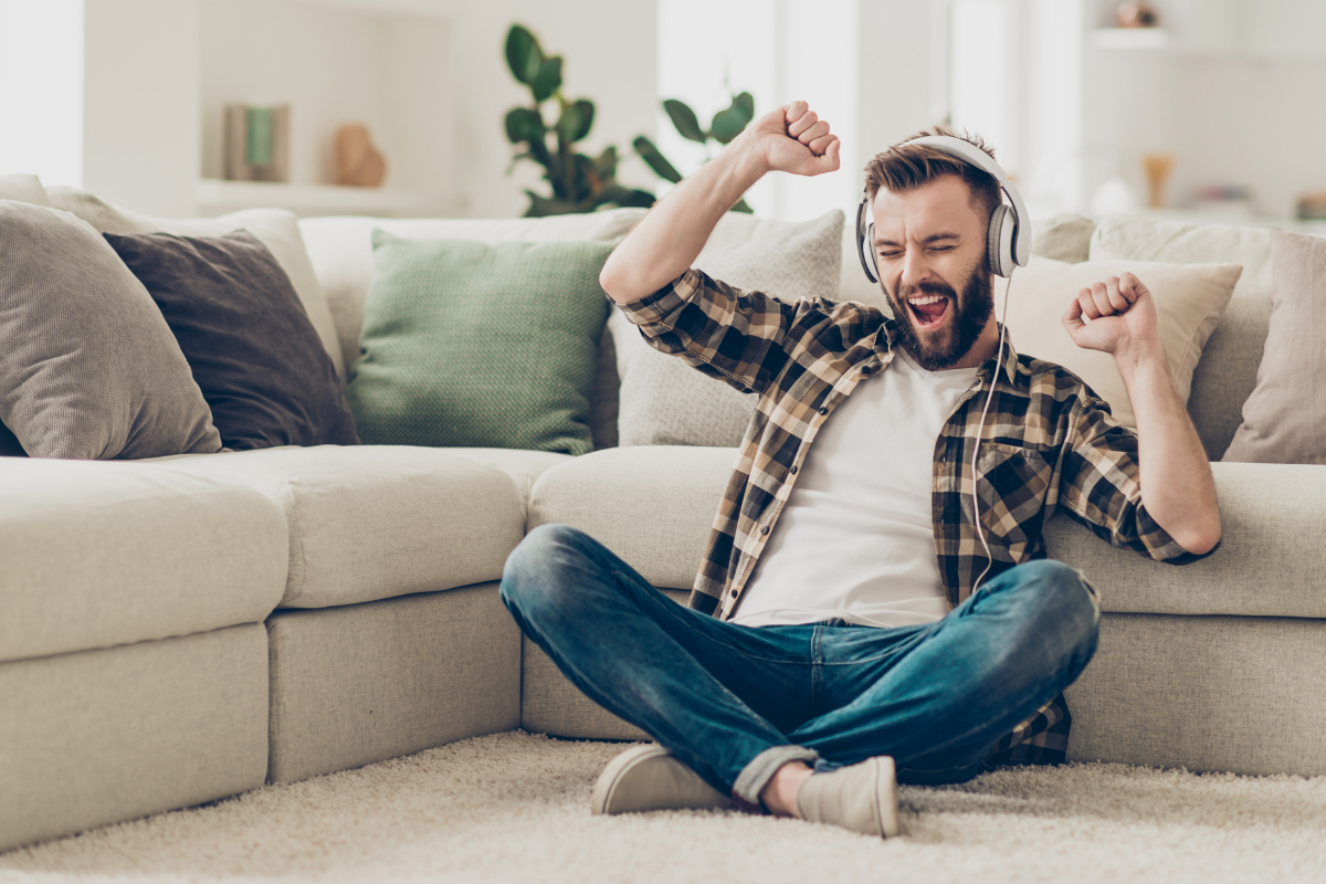 man singing on the floor